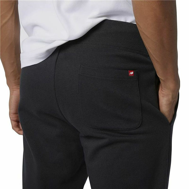Long Sports Trousers New Balance Essentials Stacked Logo Black Men