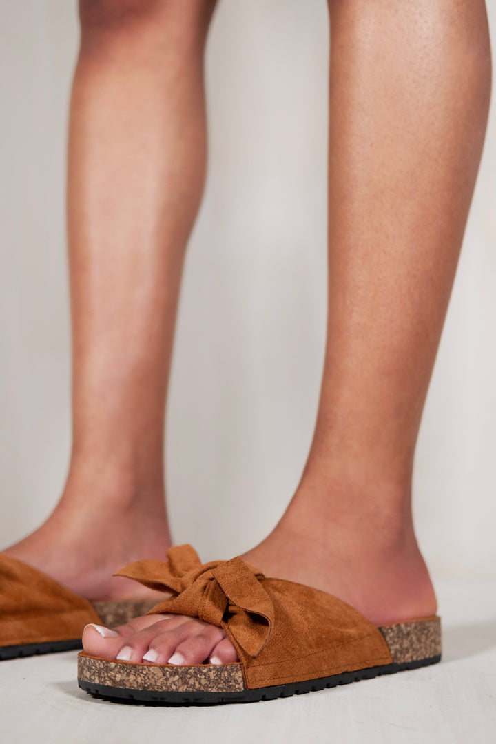 CALLIOPE SLIP ON SLIDER WITH LARGE BOW FRONT IN CAMEL SUEDE